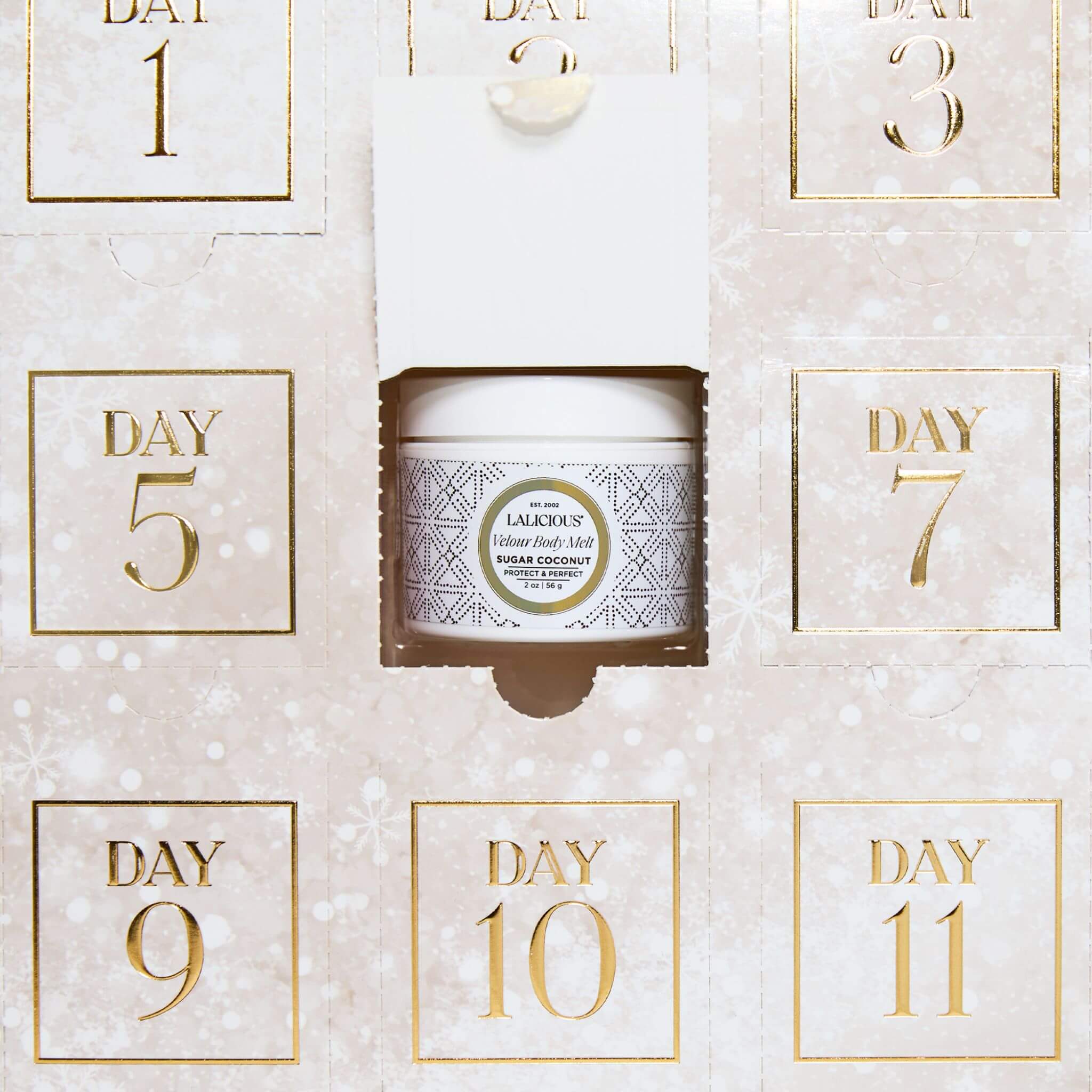 Advent Calendar - LALICIOUS with a window open showing a 2oz Velour Body Melt