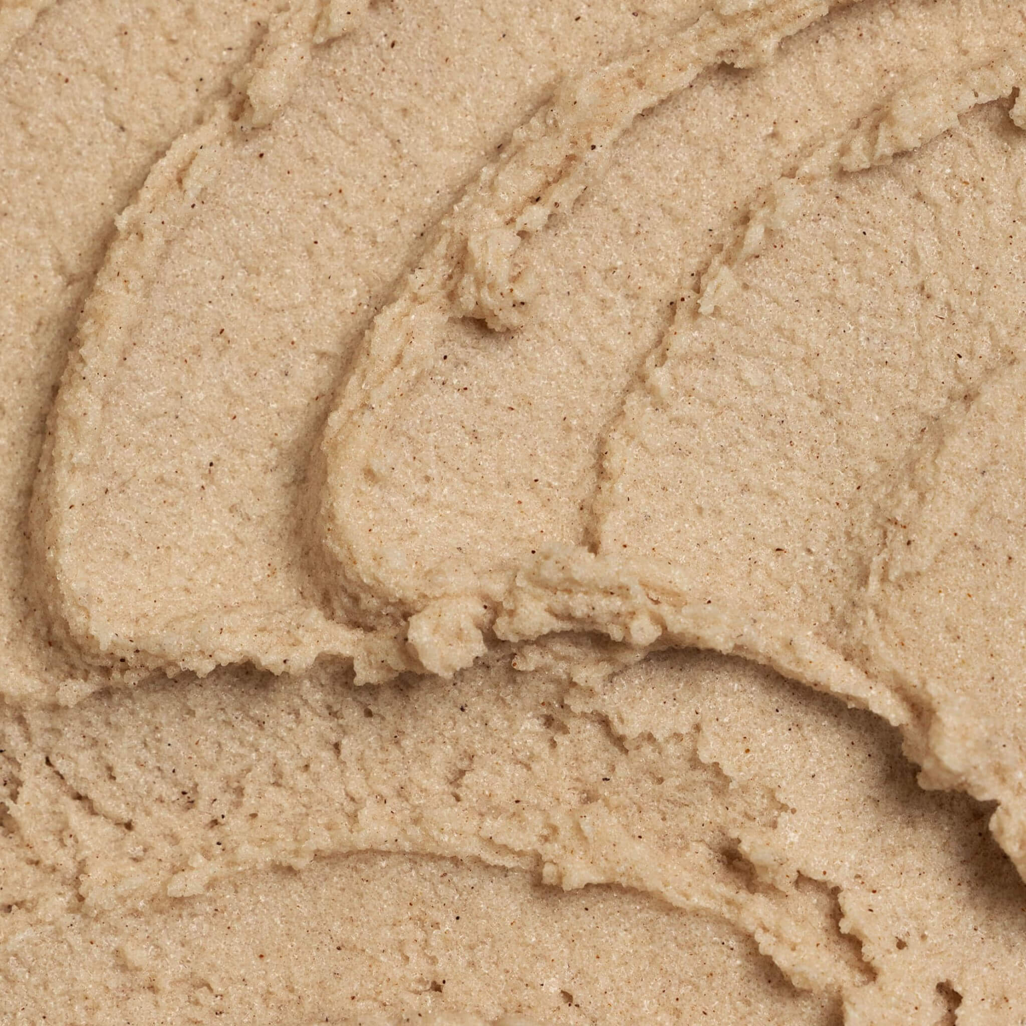 Close-up of beige sugar scrub with natural patterns. Sugar & Spice texture scrub - LALICIOUS