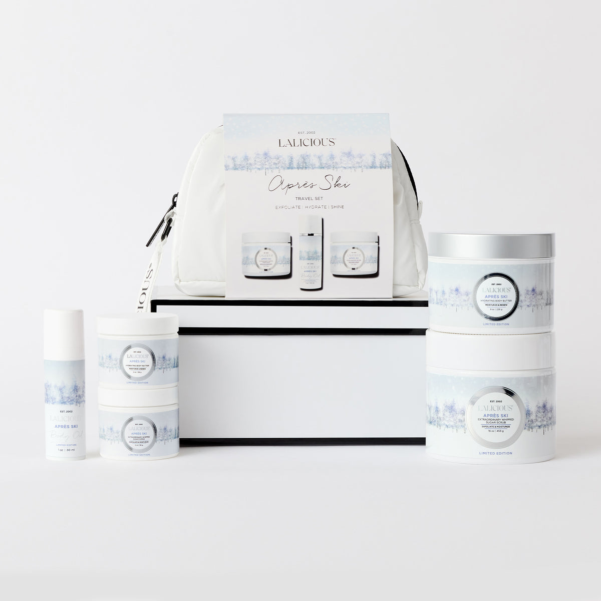 Après Ski Product Collection Sugar Scrub, Body Butter, travel set and box on a white background. LALICIOUS